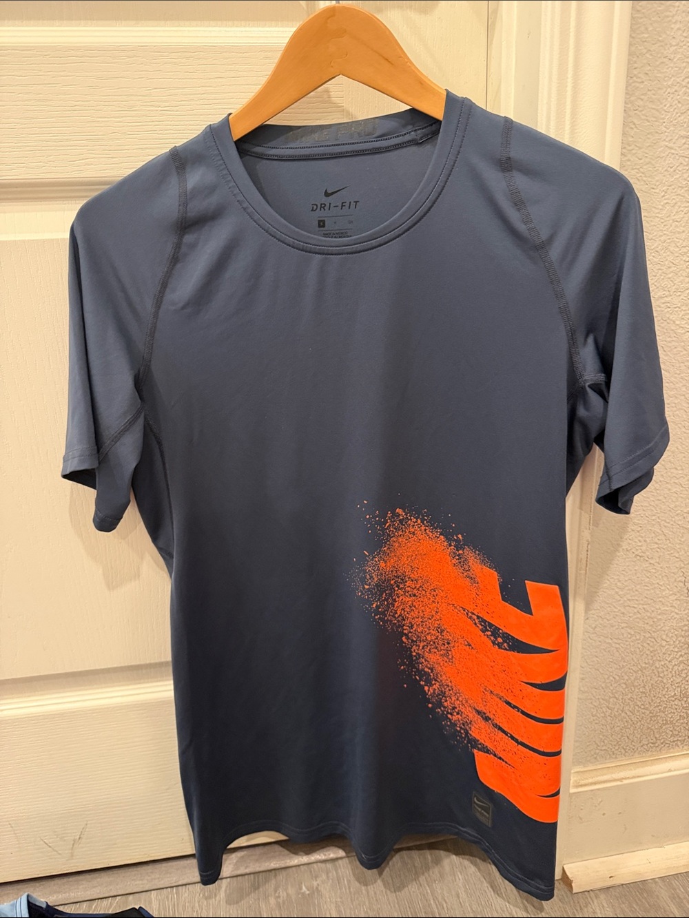 Nike Men’s Navy Short-Sleeve Dri-FIT Tee with Orange Graphic